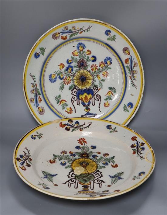 Two large Spanish faience pottery chargers, c.1840, diameter 34cm